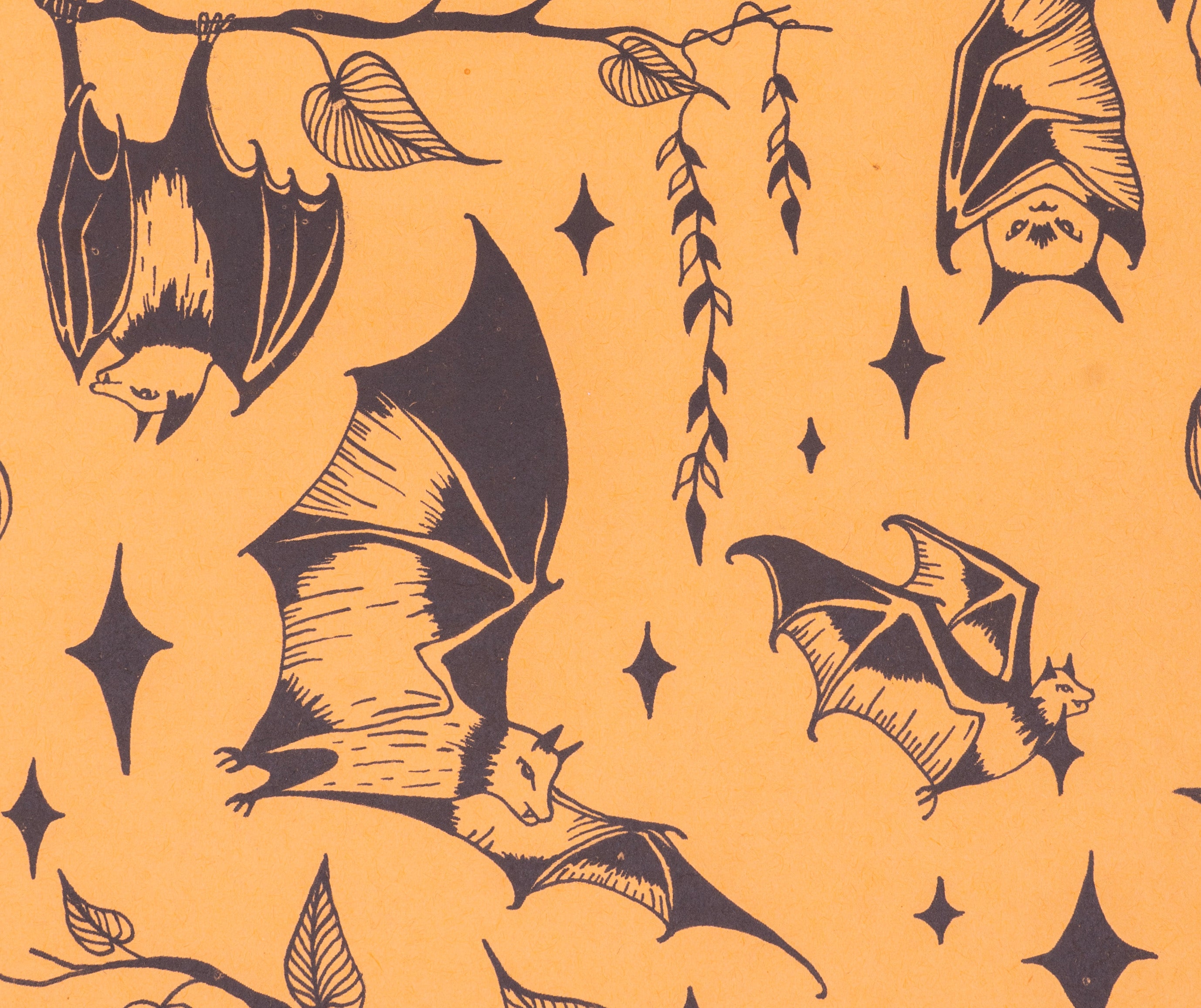 Illustrations of bats on a yellow background with star shapes.