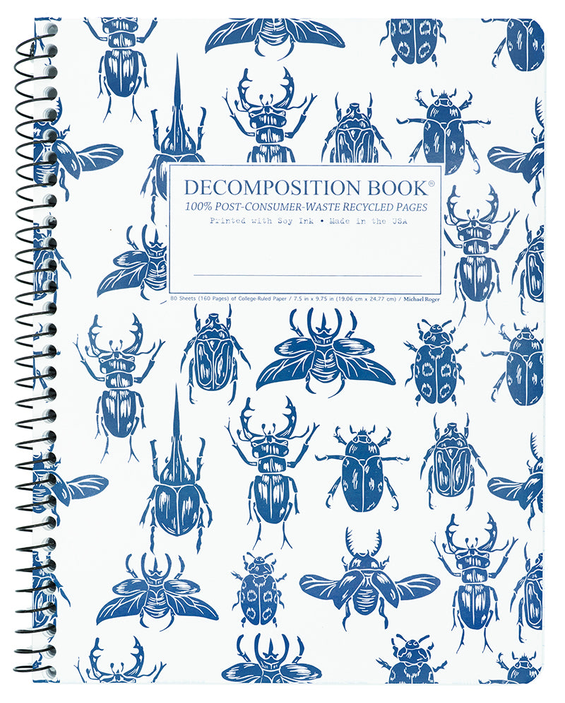 Notebook with beetle illustrations on a white background