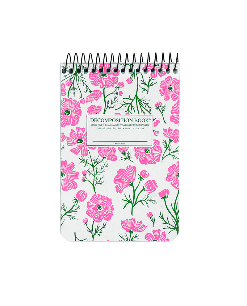 Notebook with floral design on a white background