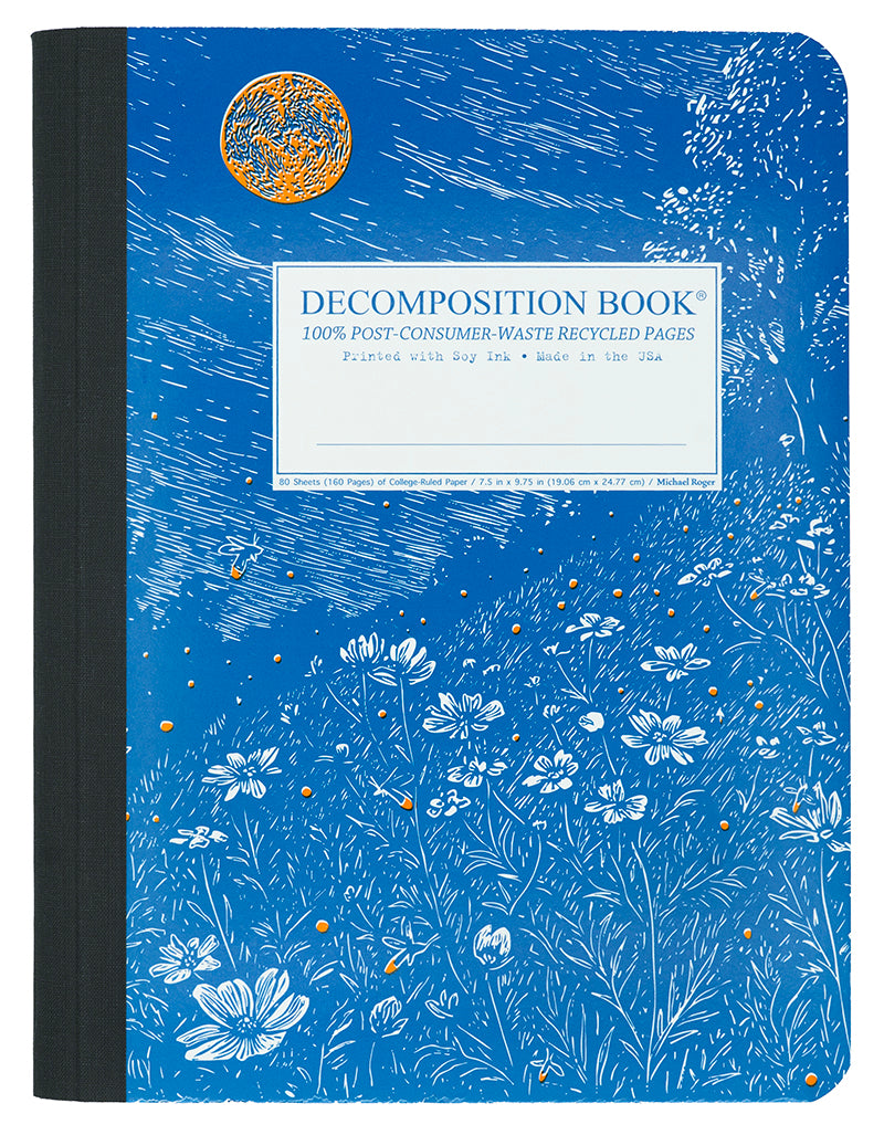 Blue notebook with floral design and 'Decomposition Book' label on a white background