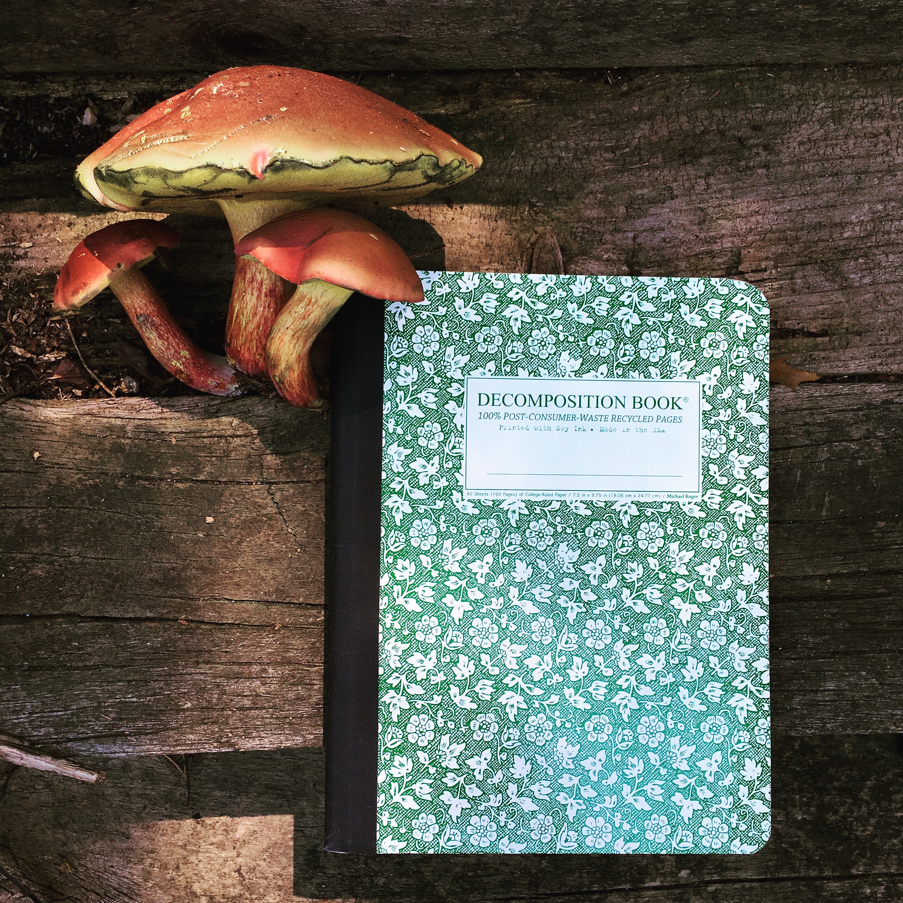 Sewn composition book printed with green flowers