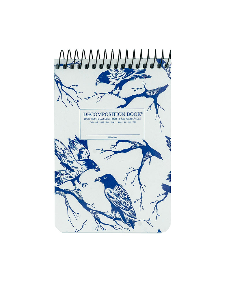 Notebook with bird illustrations on a white background