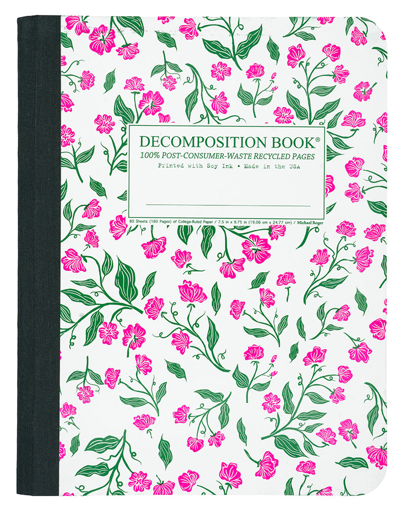 Notebook with floral pattern and black binding on a white background