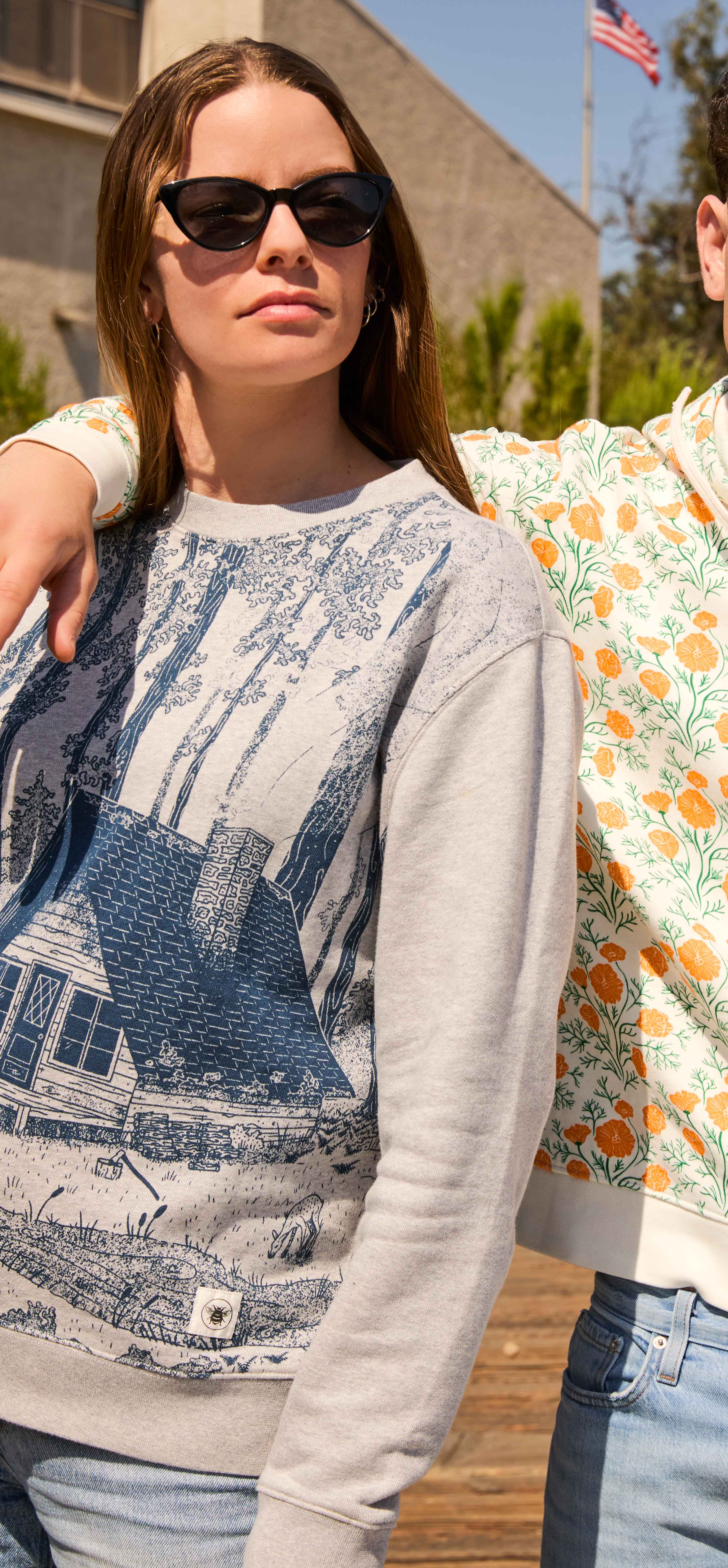 woman wearing redwood creek sweatshirt