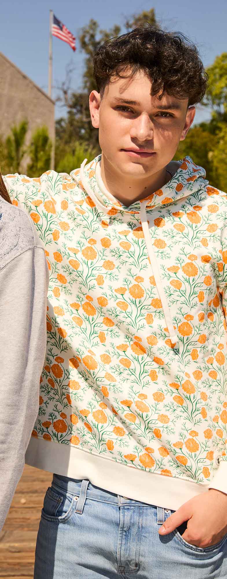 male model wearing california poppies sweatshirt