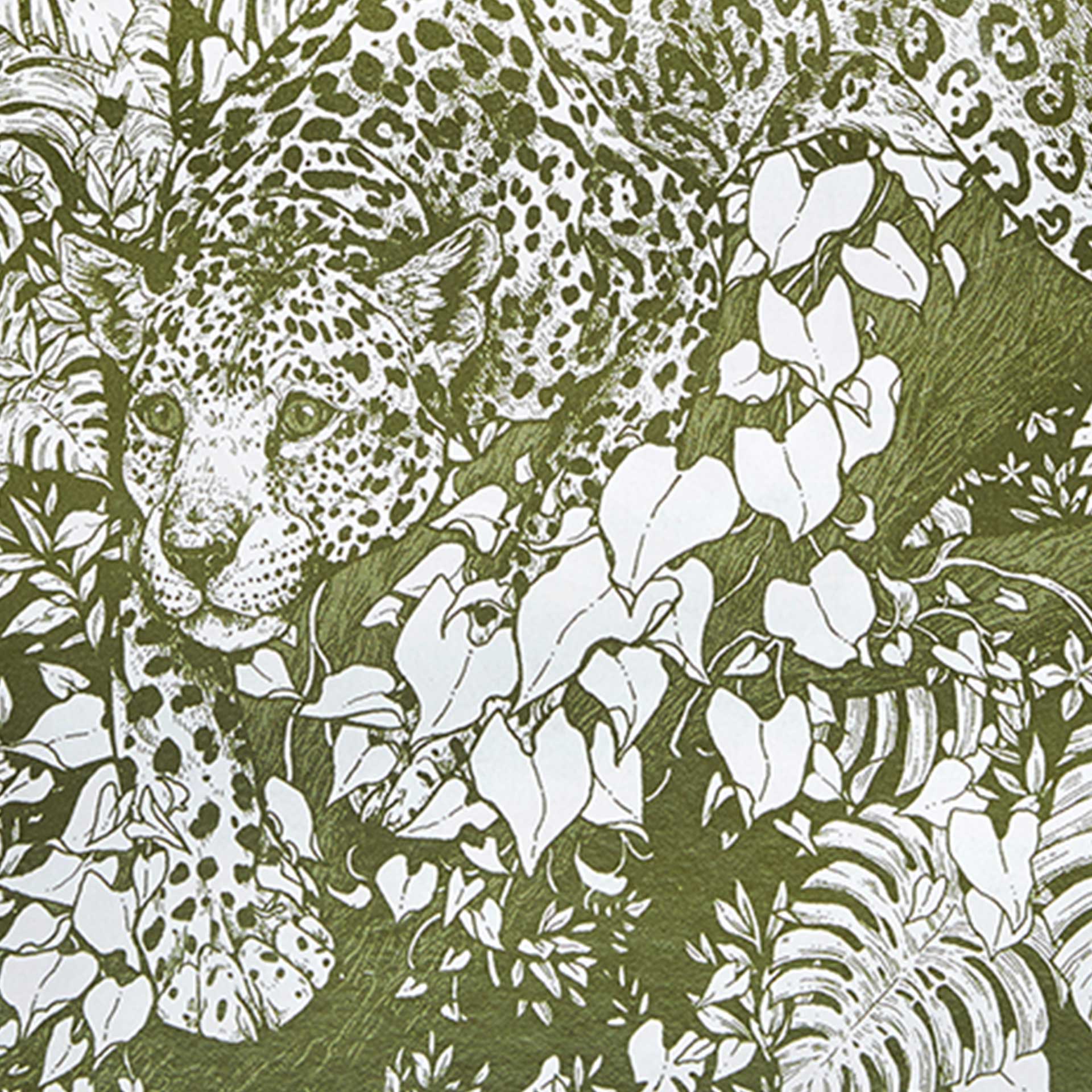 Closeup of a printed jaguar crouched in a forest